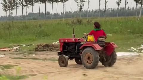 What is this man going to do with the tractor?