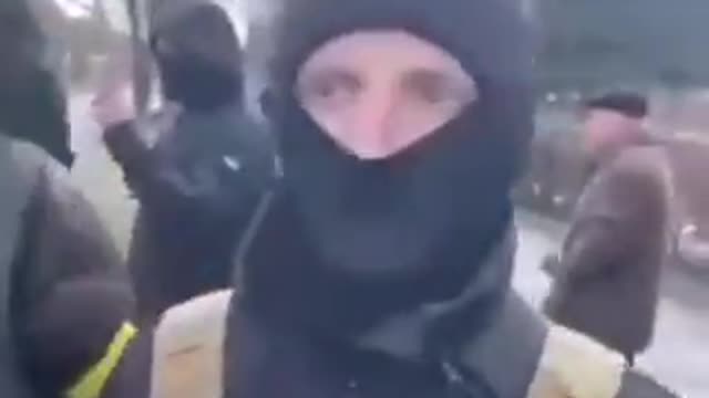 Ukrainian militias roaming the streets committing human rights violations in broad daylight