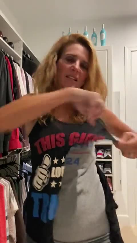 Ron DeSantis Supporter Krazy Krista Cutting Trump Shirt - Is she Paid to Do This?