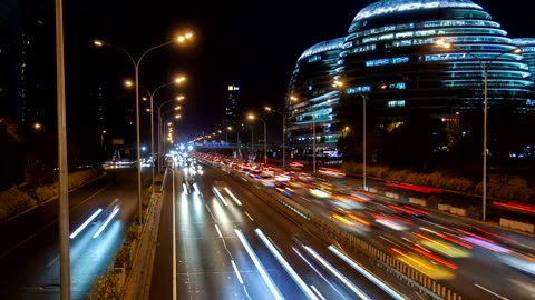 Beijing city highway with traffic and buildings