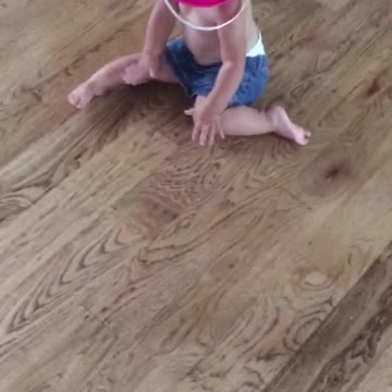 Tiny Bucket Head Goes Full Speed Ahead Into Living Room Wall