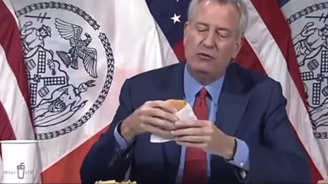 New York City Mayor Bill de Blasio Eats Burger in Bizarre Vaccination Promotion: "Mmm, Vaccinations"