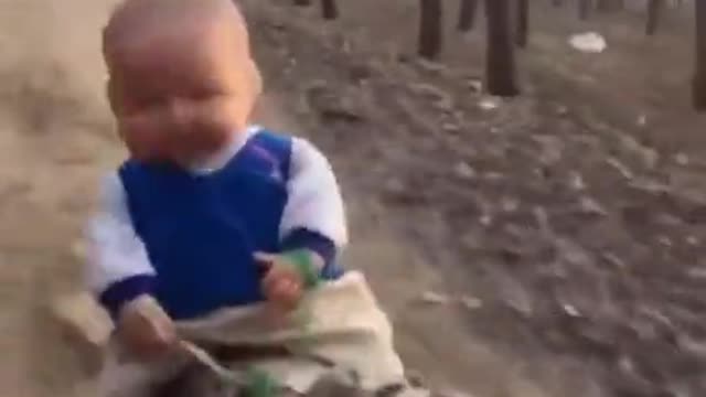 Baby Rides A Dog Full Speed