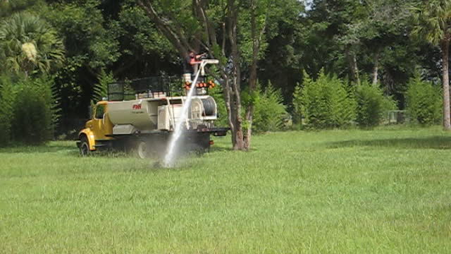 Putting down grass seed at the Running Bird Ranch