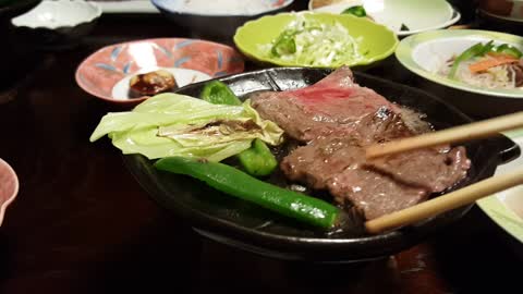 Video of grilling meat at a Japanese set meal