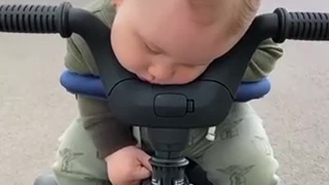 Child falls asleep at the wheel
