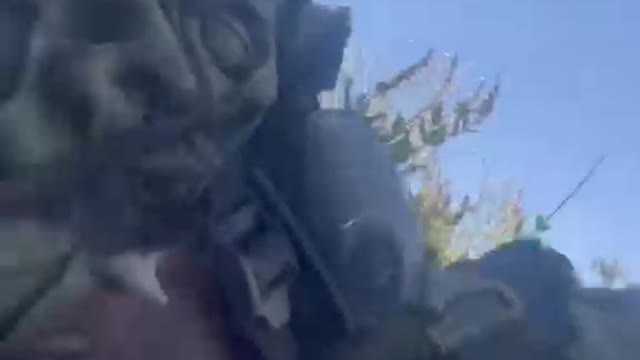 A serviceman of the Armed Forces of Ukraine under fire from rocket artillery