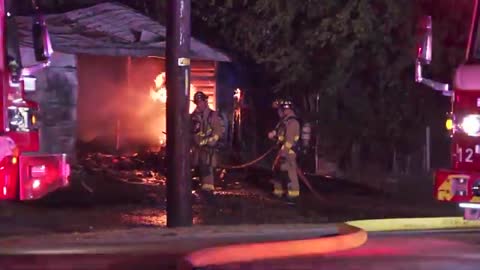 Fire spreads from shed to home, completely destroying both structures