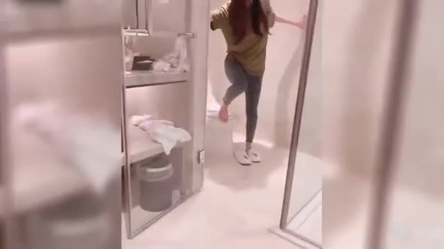 Beautiful women dance happily on the toilet