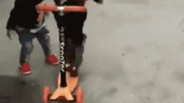 Rides the scooter doggy styles
