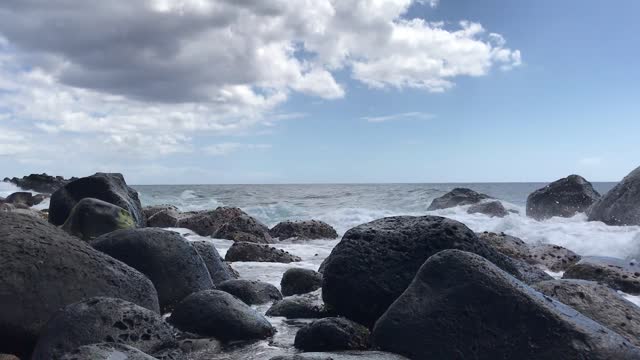 Crashing wave at a rocky shore