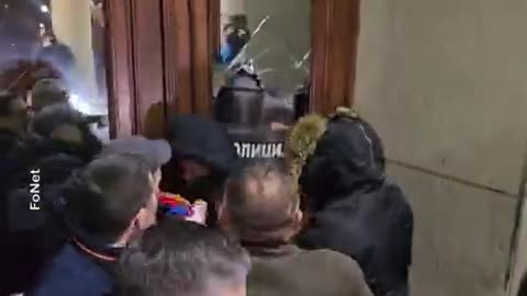 BREAKING-PROTESTORS TRYING TO BREAK INTO THE CITY HALL IN BELGRADE, SERBIA