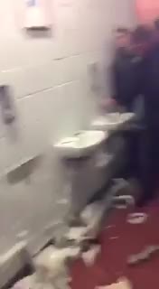 VIDEO: Shocking Footage As Man City Fans Annihilate Old Trafford Toilets