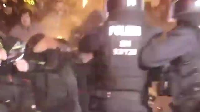 Police deployed pepper spray against a group of protesters who charged at them