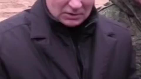 Watch as Putin fires rifle at training camp