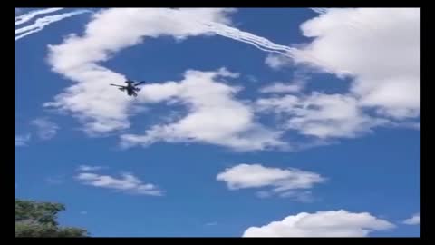 A Ka-52 Helicopter Flares Released For Decoy Over A Column Of Tatsinsky Tank Brigade