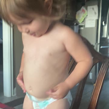 Hilarious 2 year old makes a “belly bagel”