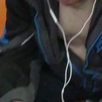 Man on phone subway headphones long thumb nail