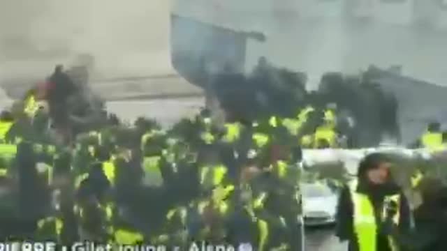 French Police Face Off with French Protesters. Yellow Vests Resist.