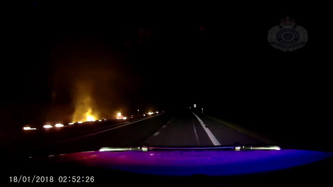 Queensland Police publish video of car driving with burning trailer