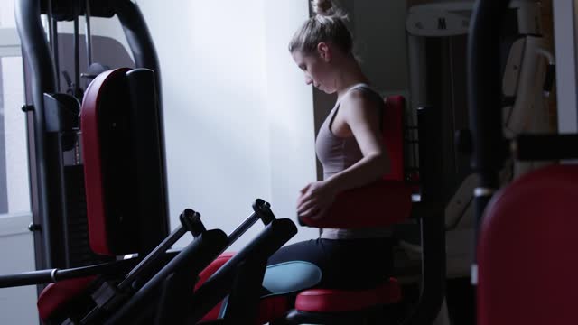 Woman doing back training exercises