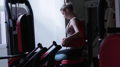 Woman doing back training exercises