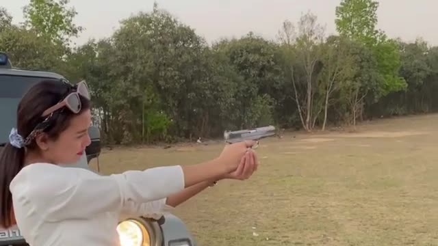 Viral video girl shooting gun