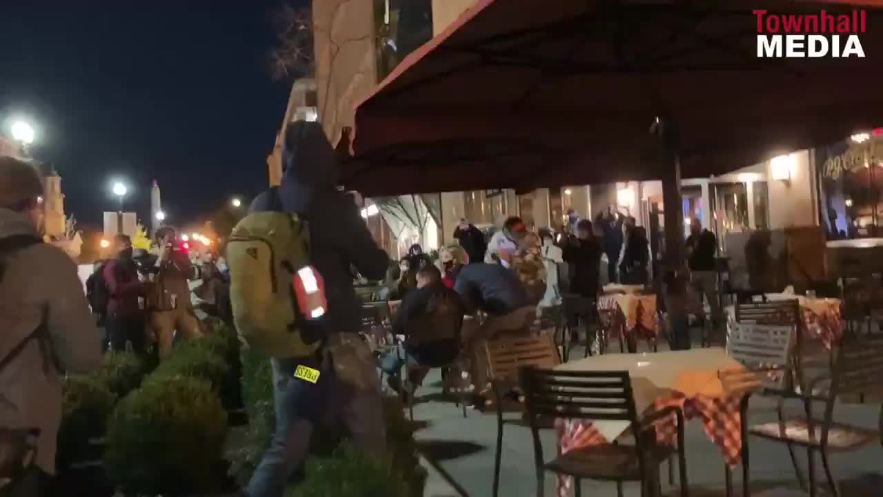 Antifa and BLM attack diners with fireworks and hurl things at them.