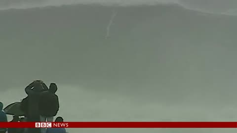 CARLOS BURLE RIDES A GIANT NAZARE WAVE - BBC NEWS