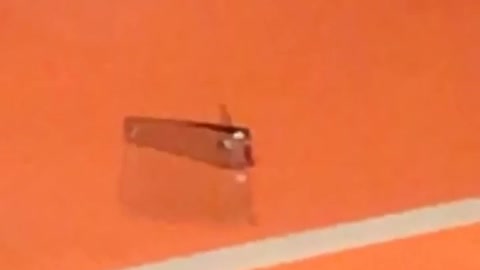 Nail clippers on orange train chair