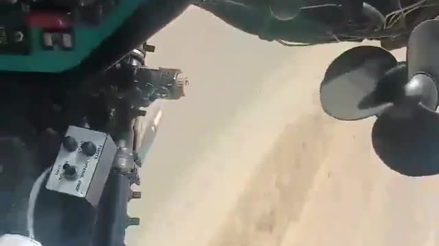 Protecting military convoys on a road in the Syrian desert(Mi-24).