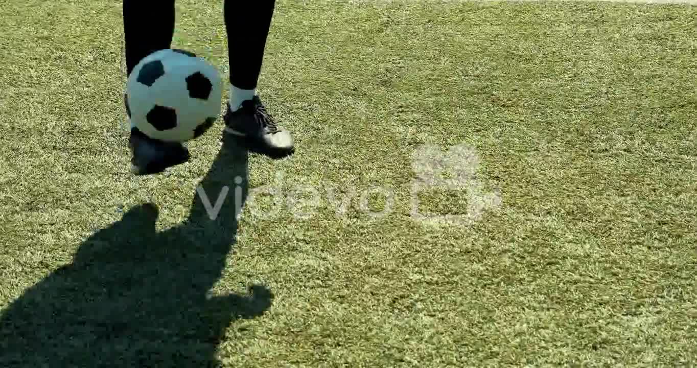 Close Up Of An Unrecognizable Soccer Player Training Freestyle Tricks With The Ball O A Street Footb