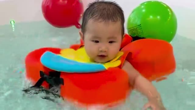My brother is so happy swimming