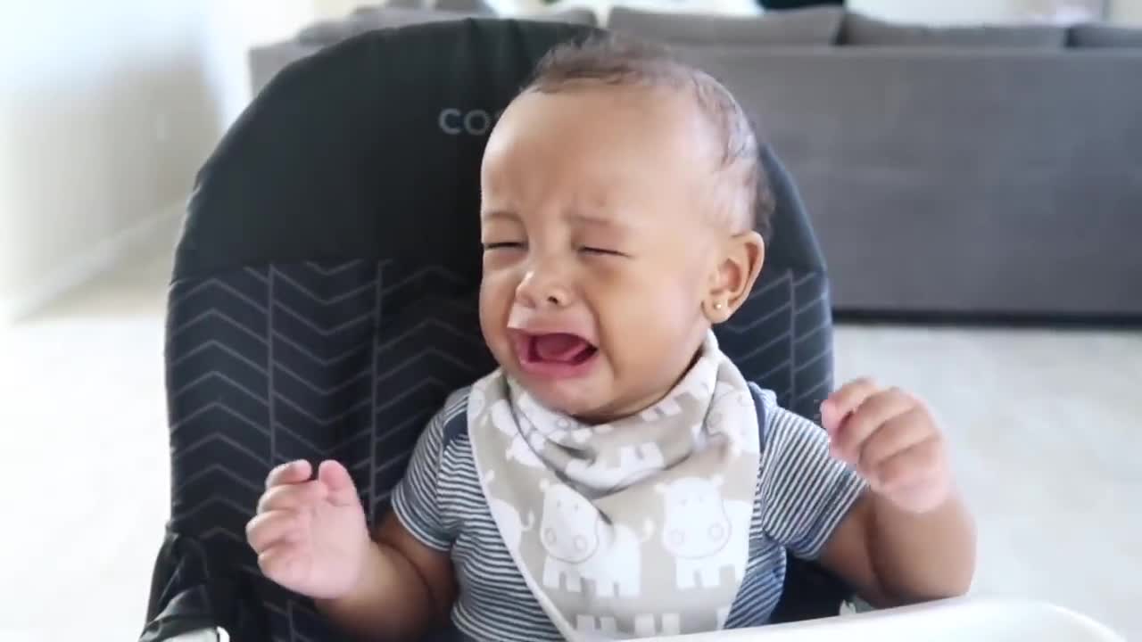 You will be surprised with curious baby first time of trying lemon