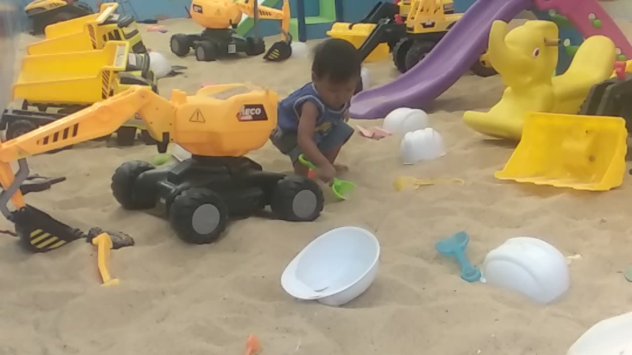 little akai playing in the sand 2