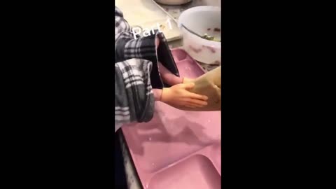 Hilarious Texas woman skillfully uses tiny toy hands to wrap her vegan tamales