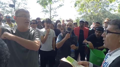 Dozens of Muslims surround to heckle one preacher #Speakers' Corner