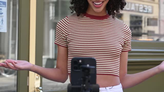 Woman Recording Video Using Cellphone