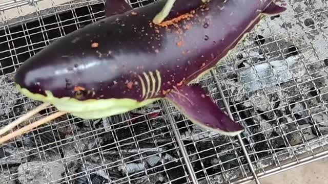 'Baby shark' cooked on BBQ grill in viral video'Baby shark' cooked on BBQ grill in viral video