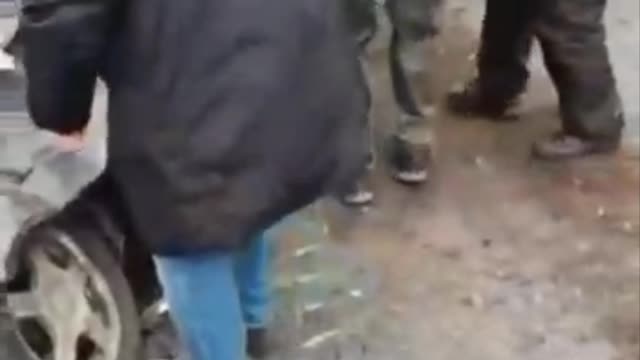 Ukraine. Armored vehicle hits civilian car in Kiev