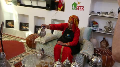 Pouring Mint Tea at a Moroccan Luncheon