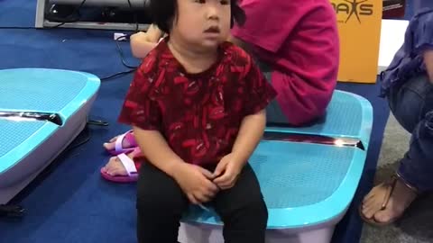 Cute Girl Loves To Feel The Good Vibrations On Exercise Board