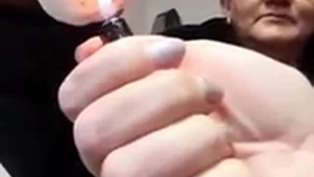 This Is Not Snow! Woman Puts Lighter To Snowball - Doesn't Melt