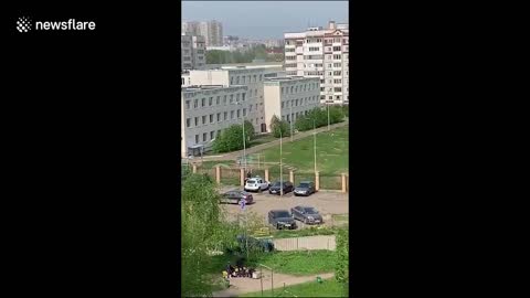 Children jump from windows to flee school shooter in Russia
