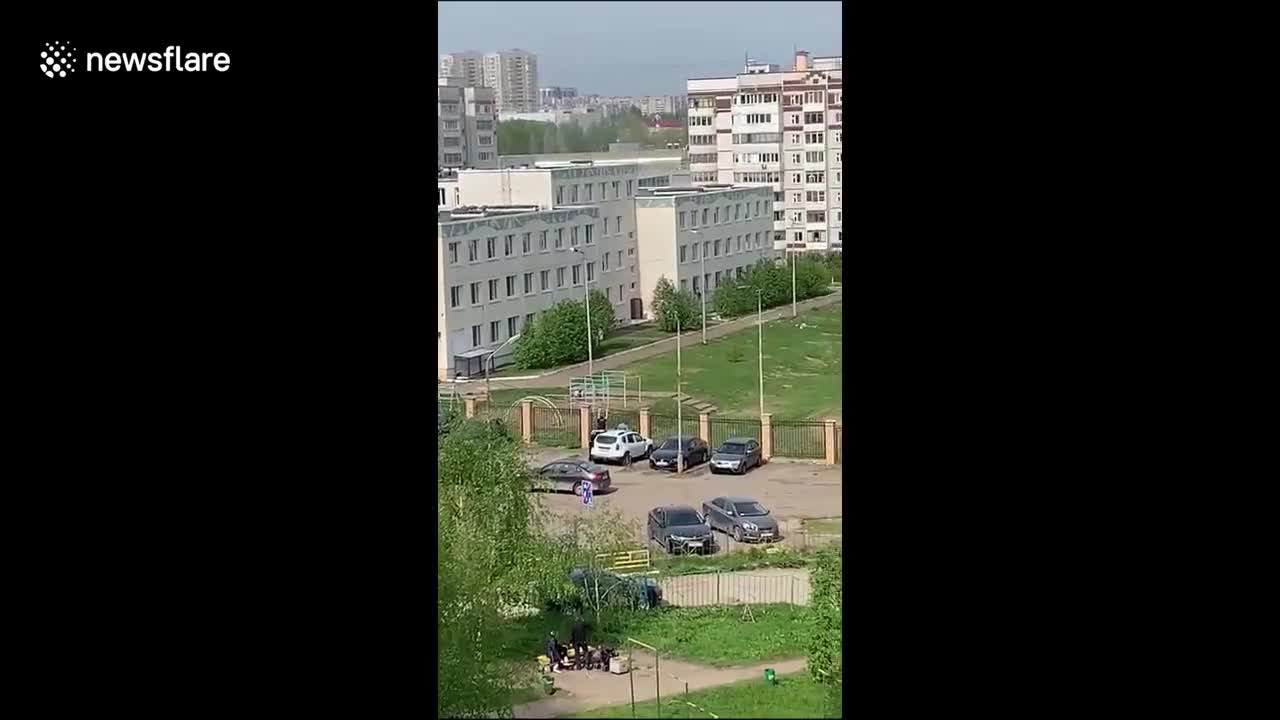 Children jump from windows to flee school shooter in Russia