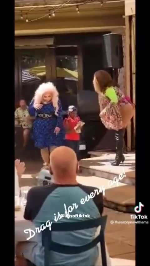 Drag Queen Teaches Child To Dance And Elderly, Disabled Person Throws Money At The Child