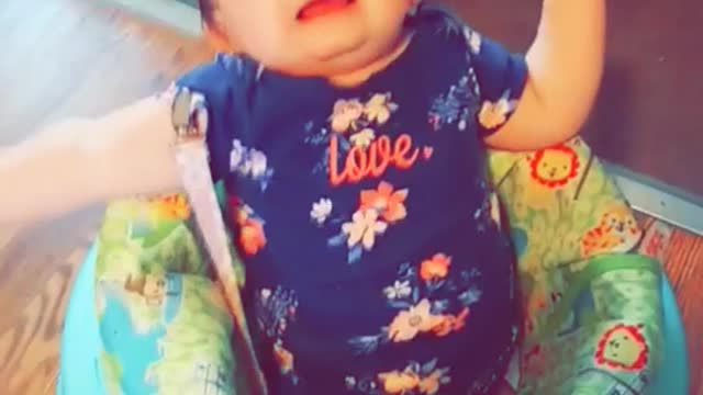 Mean momma baby in green walker scared by growl