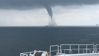 Waterspout Passes Over Ship in Singapore