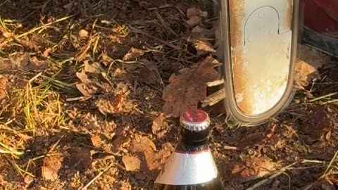 Skillfully Opening A Beer With A Chainsaw