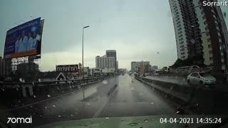 Slippery Corner Sends Car Bouncing Between Barriers